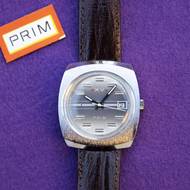 Tyto hodinky byly vyrobeny pro účastníky XV. sjezdu KSČ v roce 1976. Několik kusů se během sjezdu pokazilo a vyšetřování domnělé sabotáže skončilo až u vysoce postaveného aparátčíka komunistické strany Vasila Biľaka.