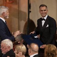 Silniční cyklista Zdeněk Štybar a jeho medaile za zásluhy.