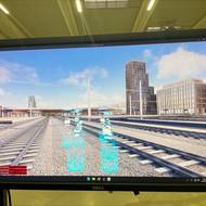 Uživatelé jsou v modelu znázorněni jako modří roboti, zabrání se tak vzájemným srážkám. 