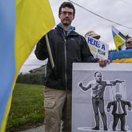 V Anchorage, kde se summit konal, se sešlo několik set lidí vyjadřujících podporu Ukrajině. 