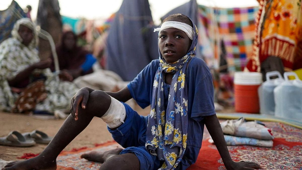 Fotky: Na útěku před masovými vraždami. „Není nikdo, kdo by pohřbil mrtvé“