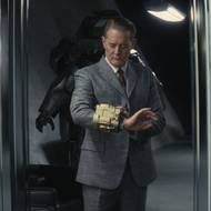 Kyle MacLachlan jako Hank.