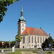 Kostel Nanebevzetí Panny Marie v Mostě.