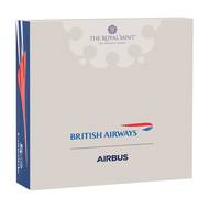 Balení pamětní mince k 50. výročí vzlétnutí letadla Concorde.