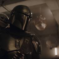 Pedro Pascal jako Mandalorian a Grogu.