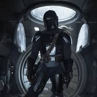 Pedro Pascal jako Mandalorian a Grogu.